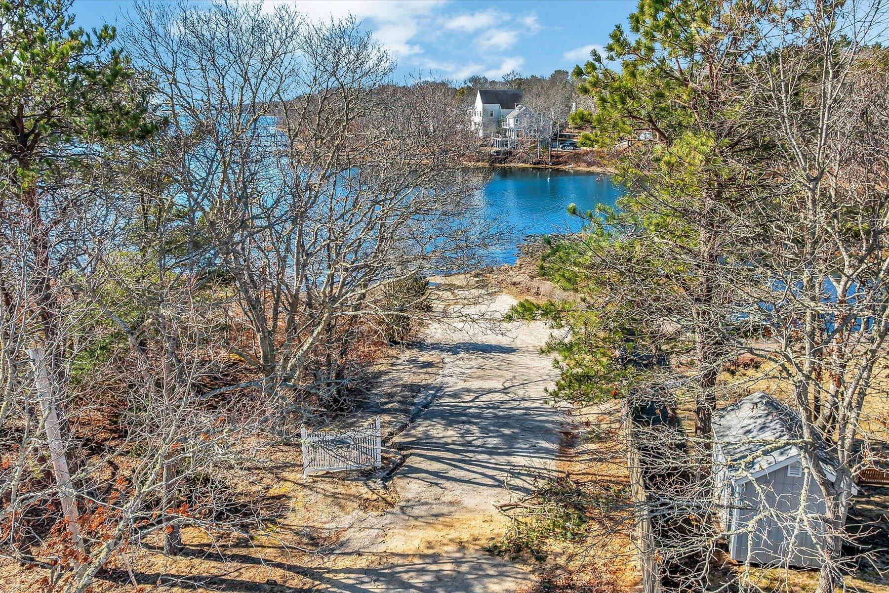 27 Madeline Road East Falmouth, MA 02536 - Photo 41 of 43 a view of a lake with large trees