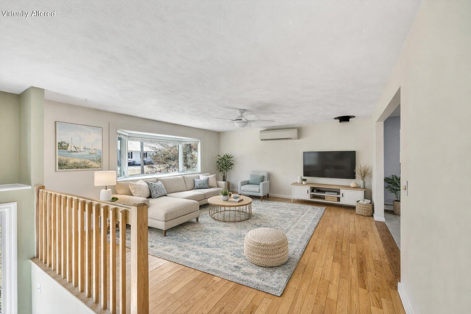 27 Madeline Road East Falmouth, MA 02536 - Photo 9 of 43 a living room with furniture and a flat screen tv