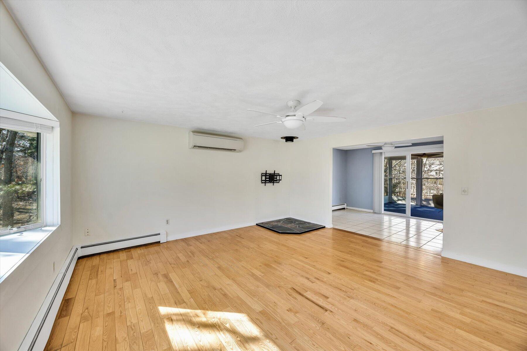 27 Madeline Road East Falmouth, MA 02536 - Photo 10 of 43 a bedroom with a bed and wooden floor
