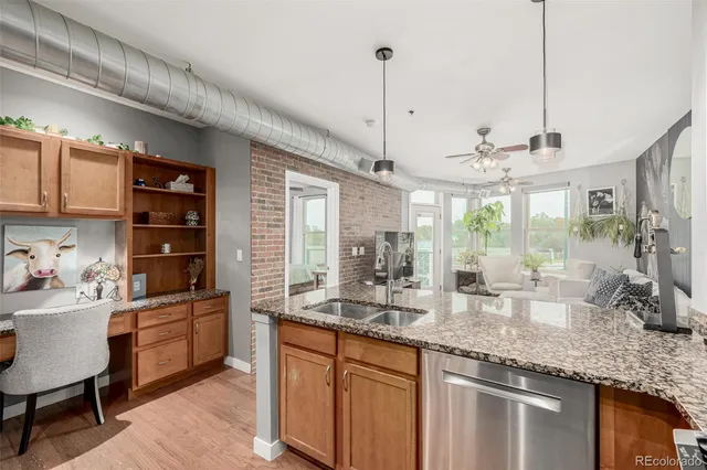 a kitchen with counter space cabinets and appliances