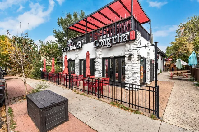 a view of a chairs and tables in the patio