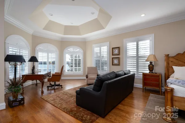 a living room with furniture or couch and a large window