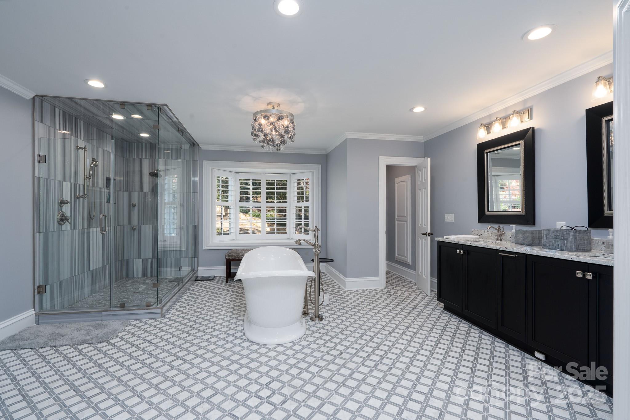444 Glenbrook Spring New London, NC 28127 - Photo 24 of 48 a large bathroom with a sink a toilet and shower