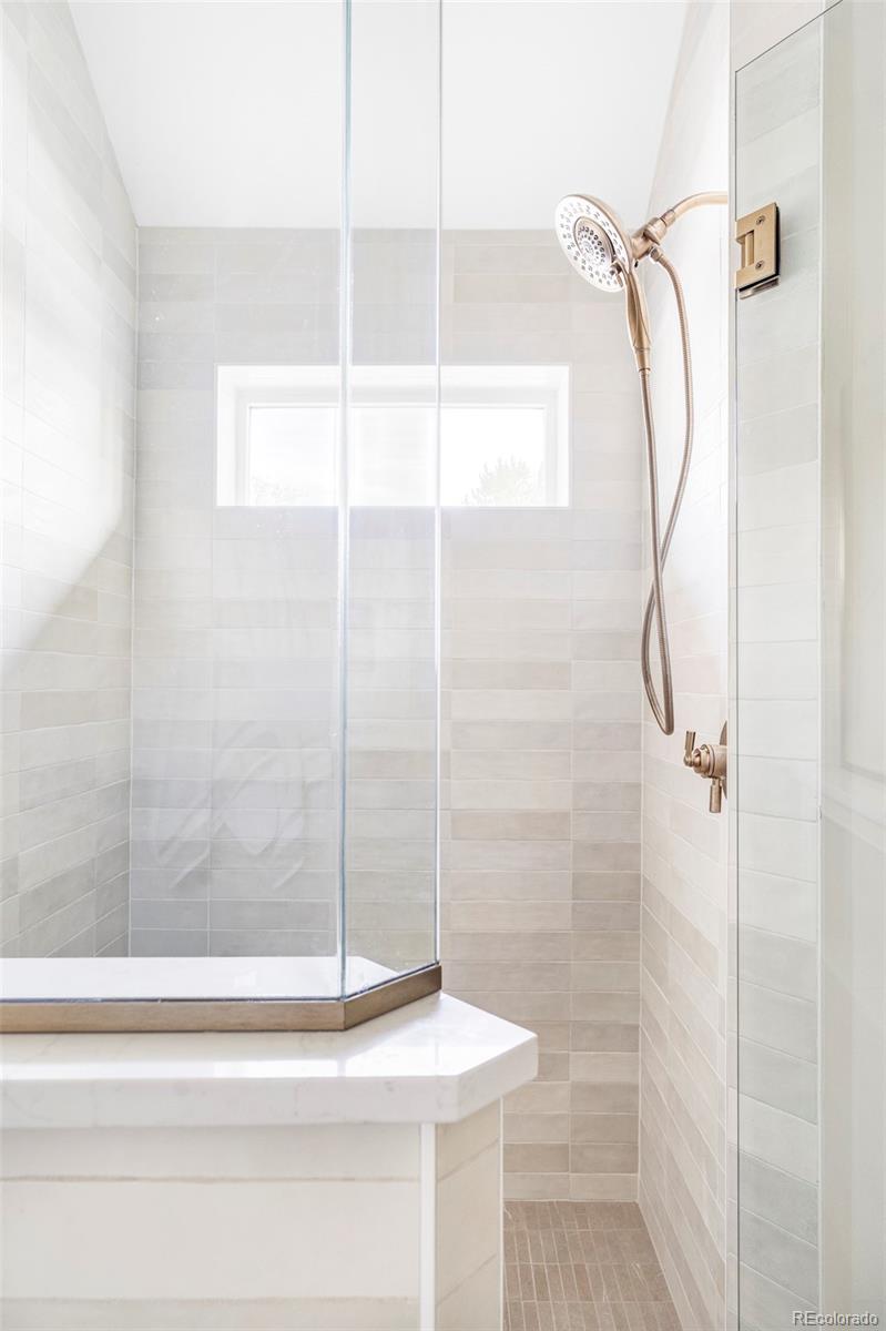 2914 Hooker Street Denver, CO 80211 - Photo 19 of 30 a bathroom that has a shower