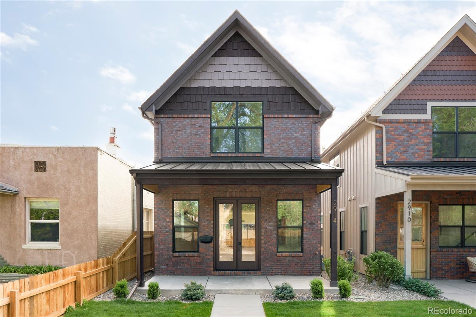 2914 Hooker Street Denver, CO 80211 - Photo 2 of 30 a front view of a house with garden