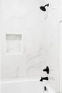 a bathroom with a bathtub