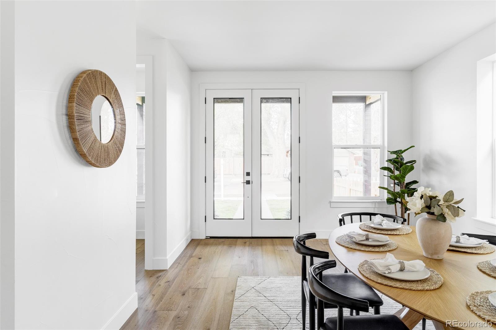 2914 Hooker Street Denver, CO 80211 - Photo 5 of 30 a view of a dining room with furniture and window
