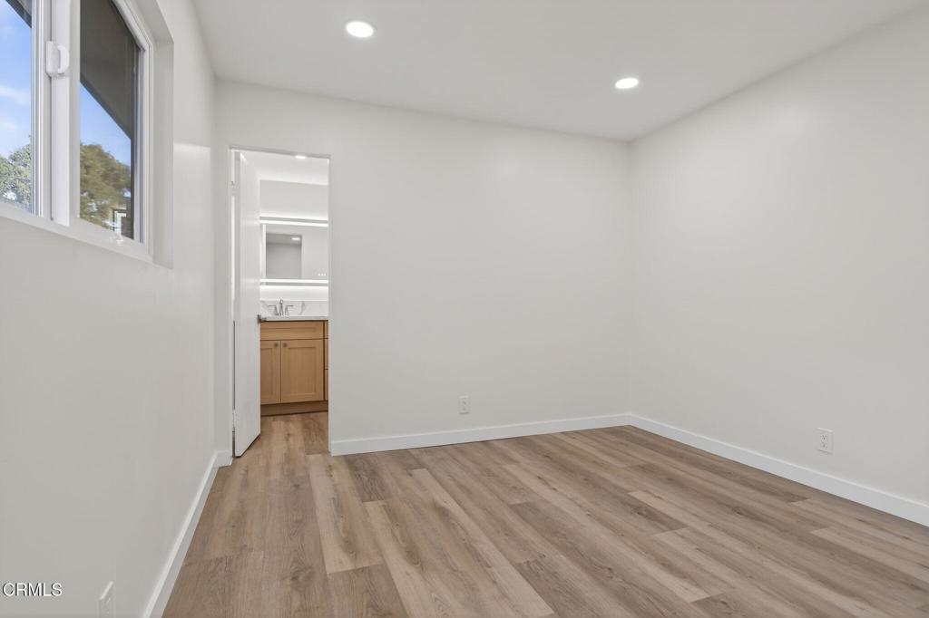312 Prospect Street Oak View, CA 93022 - Photo 14 of 45 a view of a room with wooden floor and entrance
