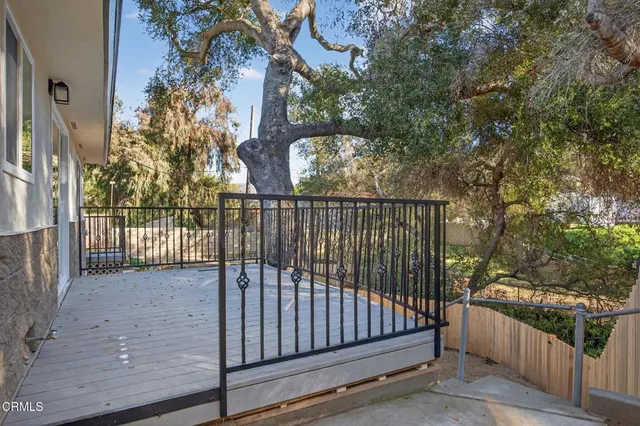 a view of a wooden roof deck