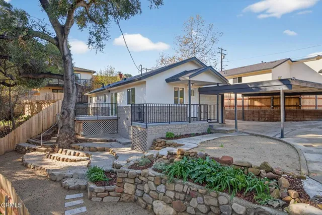 a view of a house with a patio