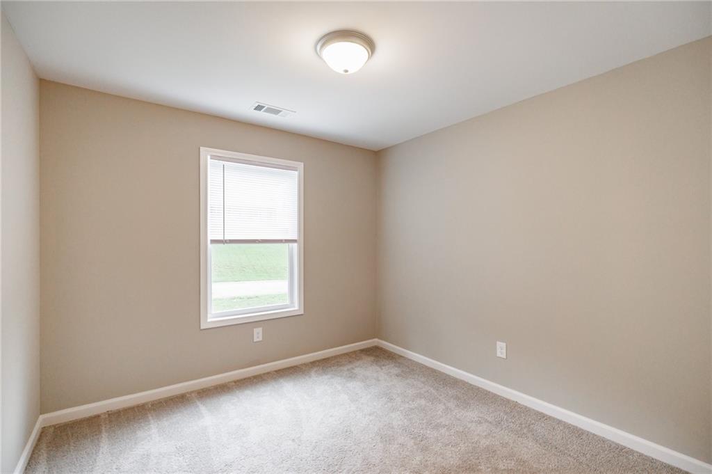 103 Three Rivers Court Hull, GA 30646 - Photo 29 of 40 an empty room with a window