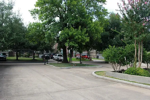 a ground with trees in the background