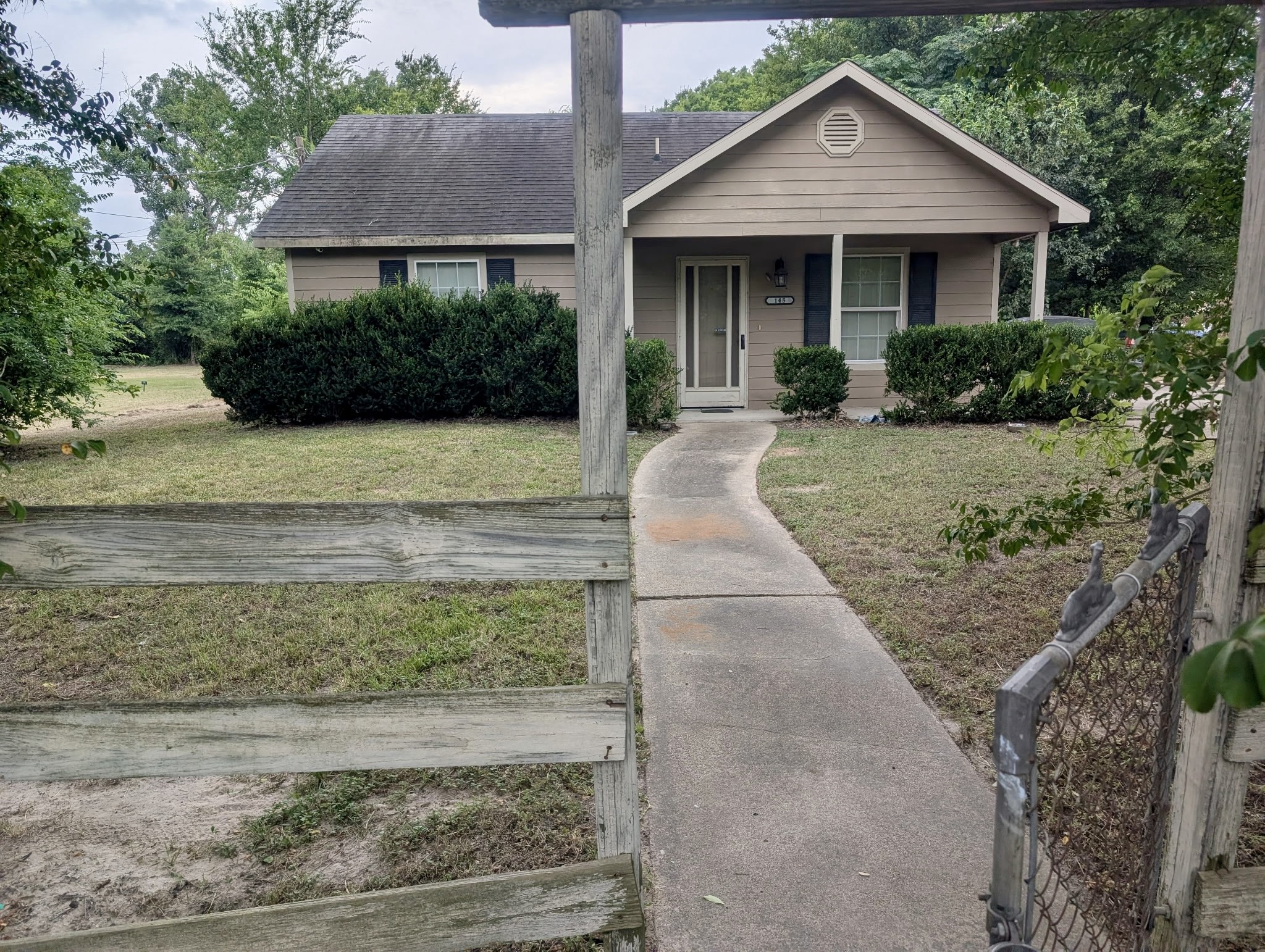 145 Marrow Street Trinity, TX 75862 - Photo 2 of 11 Gate to fenced in yard