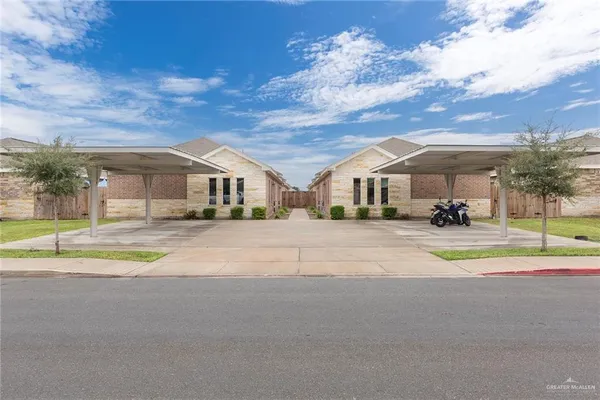 a view of house with a street