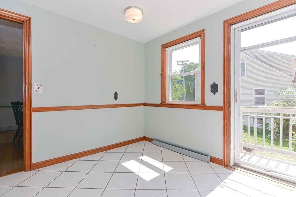 157 Vincent Road Dedham, MA 02026 - Photo 13 of 38 a view of a room with an empty space and a window