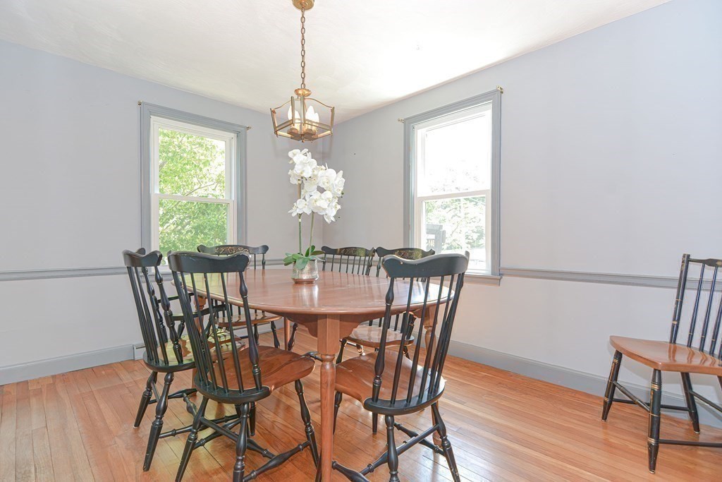 157 Vincent Road Dedham, MA 02026 - Photo 14 of 38 a view of a dining room with furniture window and wooden floor