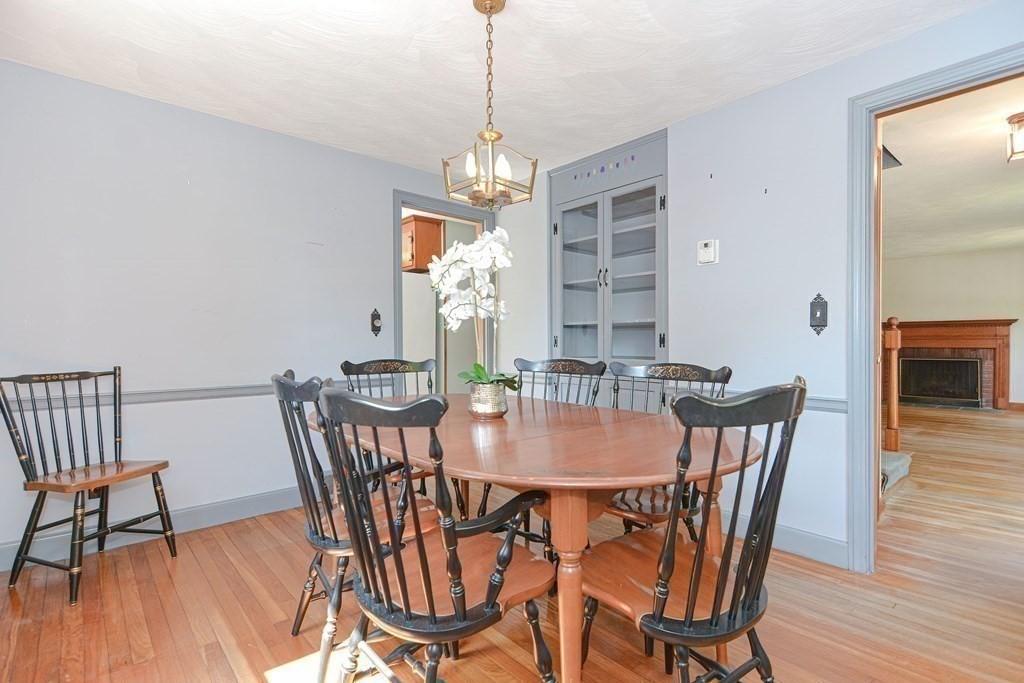 157 Vincent Road Dedham, MA 02026 - Photo 15 of 38 a view of a dining room with furniture window and wooden floor