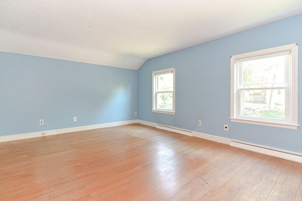 157 Vincent Road Dedham, MA 02026 - Photo 24 of 38 an empty room with wooden floor and windows