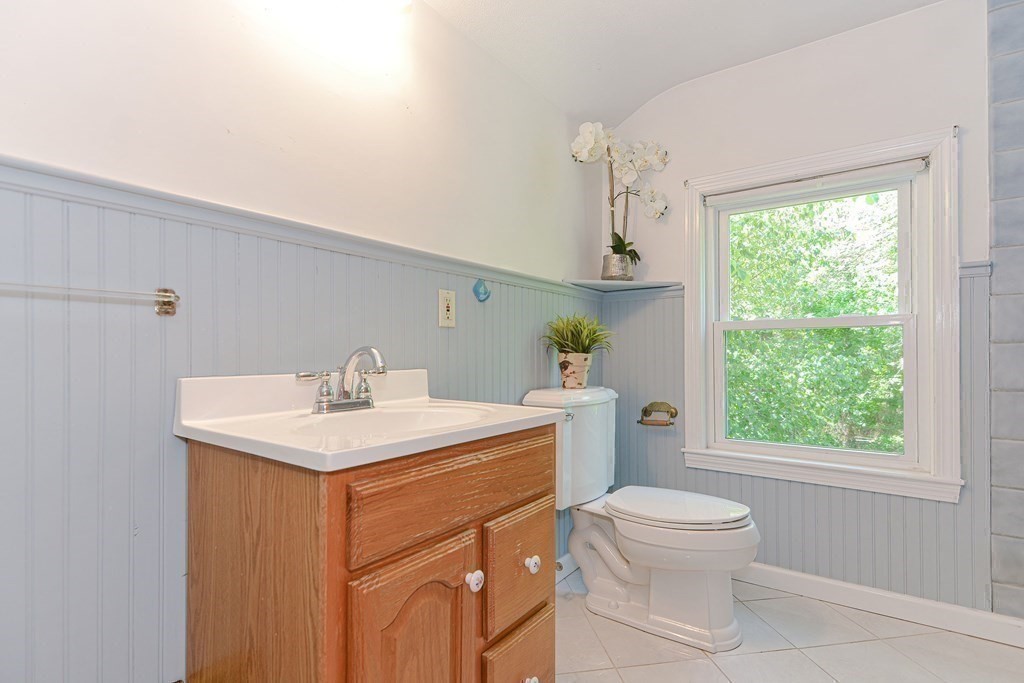 157 Vincent Road Dedham, MA 02026 - Photo 30 of 38 a view of bathroom with a sink toilet and mirror