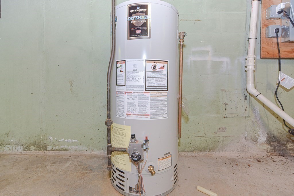 157 Vincent Road Dedham, MA 02026 - Photo 38 of 38 a bathroom with a tub shower and sink