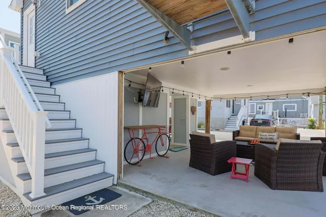a kitchen with stainless steel appliances a stove a microwave and cabinets