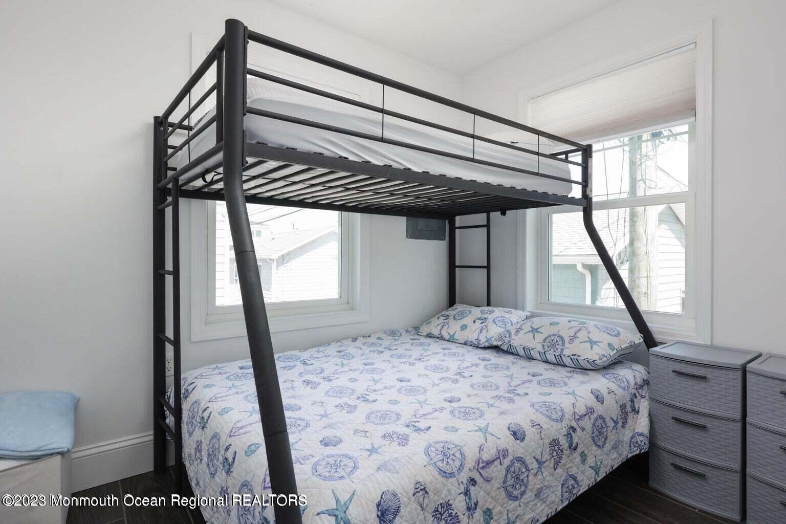 118 West Tide Way Lavallette, NJ 08735 - Photo 9 of 14 a bedroom with a bed window and a bed