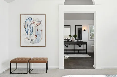 a view of a hallway with chairs