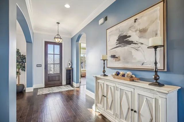 a bathroom with a tub and a sink