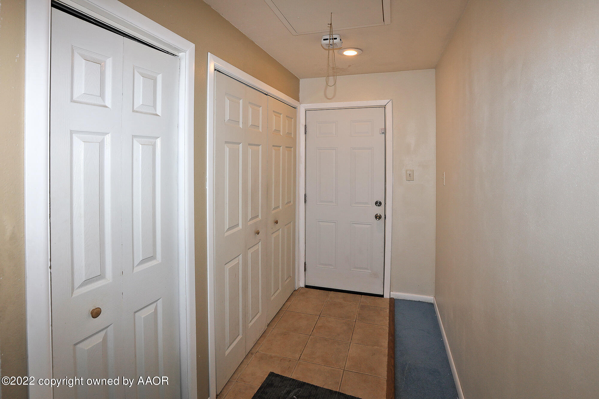 4318 South Hughes Street Amarillo, TX 79110 - Photo 18 of 25 a view of a hallway with wooden floor