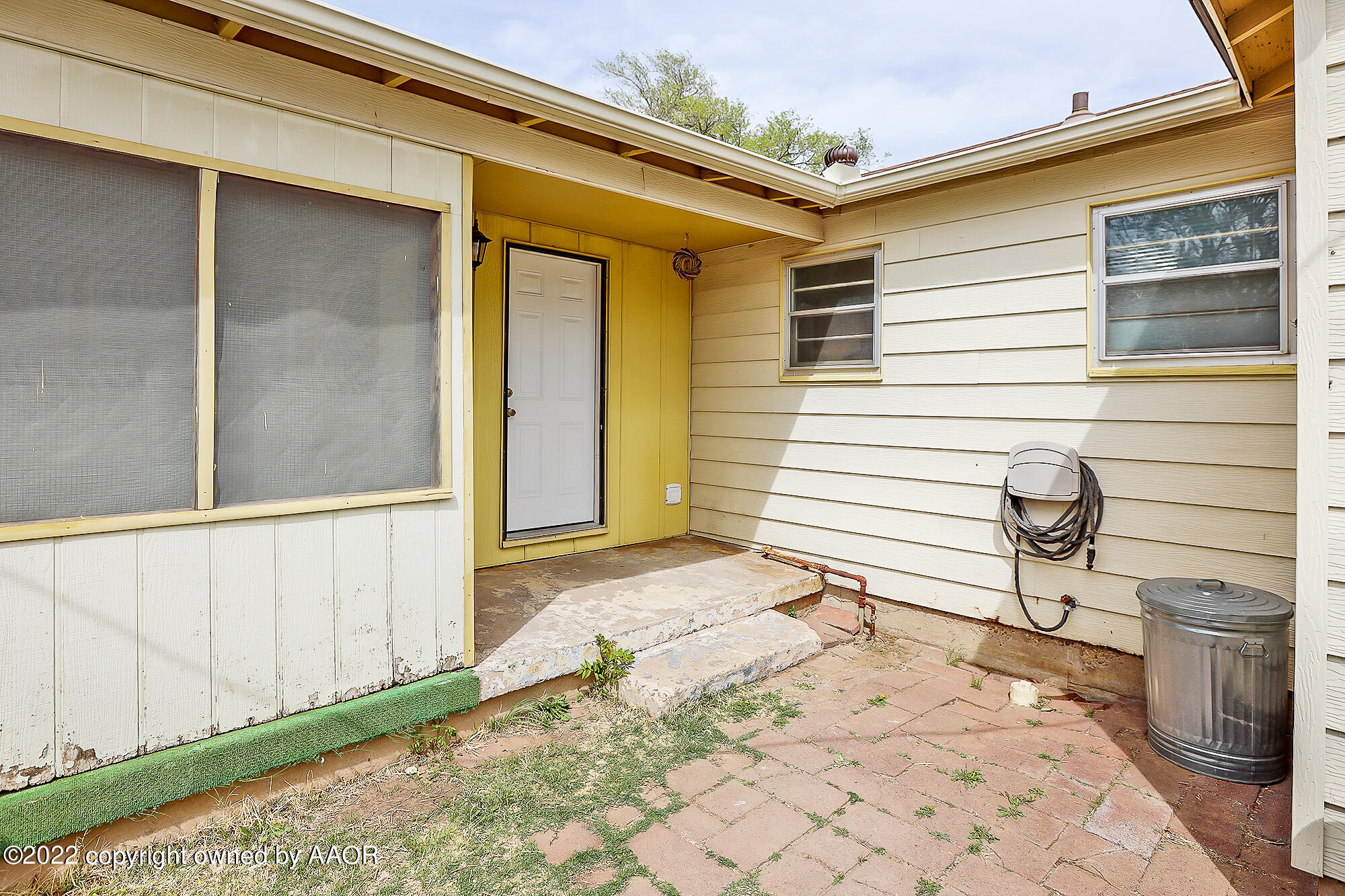 4318 South Hughes Street Amarillo, TX 79110 - Photo 19 of 25 a view of a porch with a bench