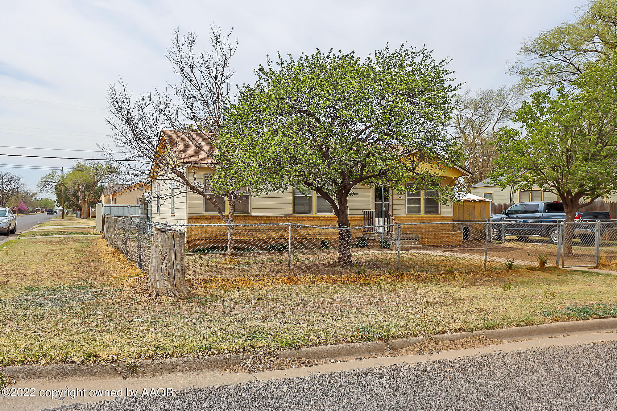 4318 South Hughes Street Amarillo, TX 79110 - Photo 24 of 25 a view of swimming pool with outdoor seating and house in the background