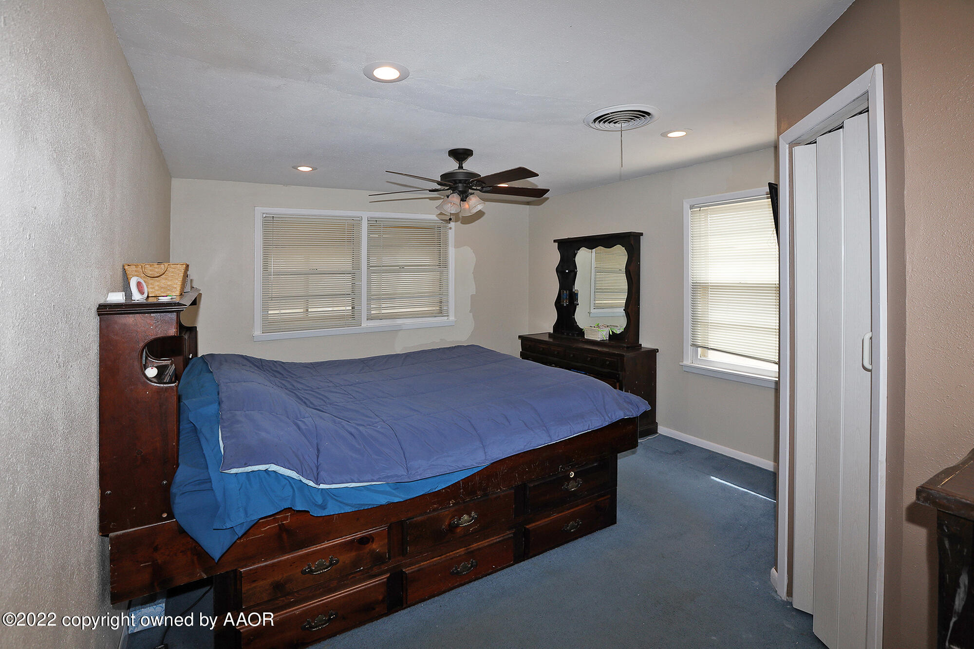 4318 South Hughes Street Amarillo, TX 79110 - Photo 9 of 25 a room with furniture and a window