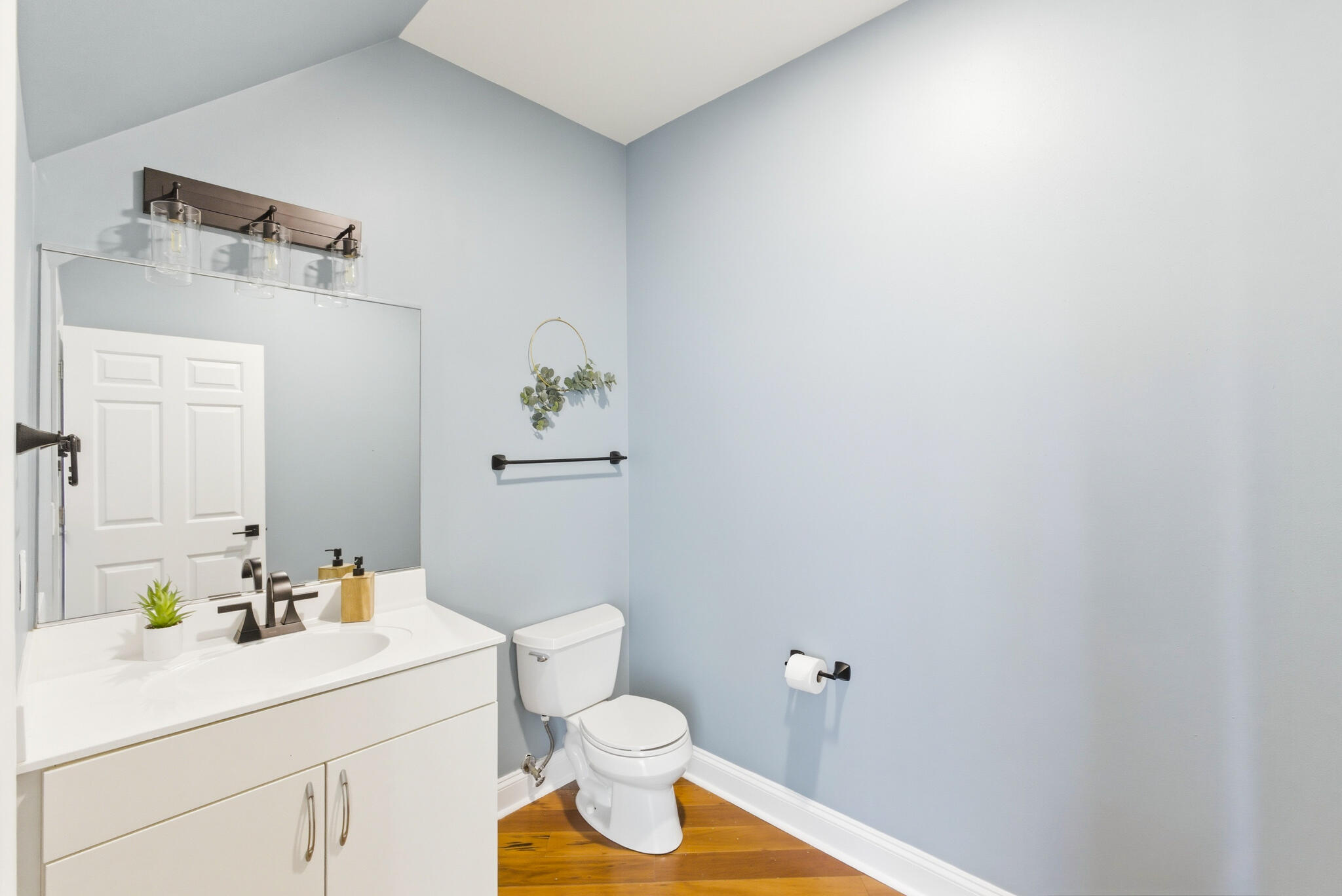 1888 North Water Street, Unit 101 Milwaukee, WI 53202 - Photo 10 of 26 Updated half bathroom on the main floor.