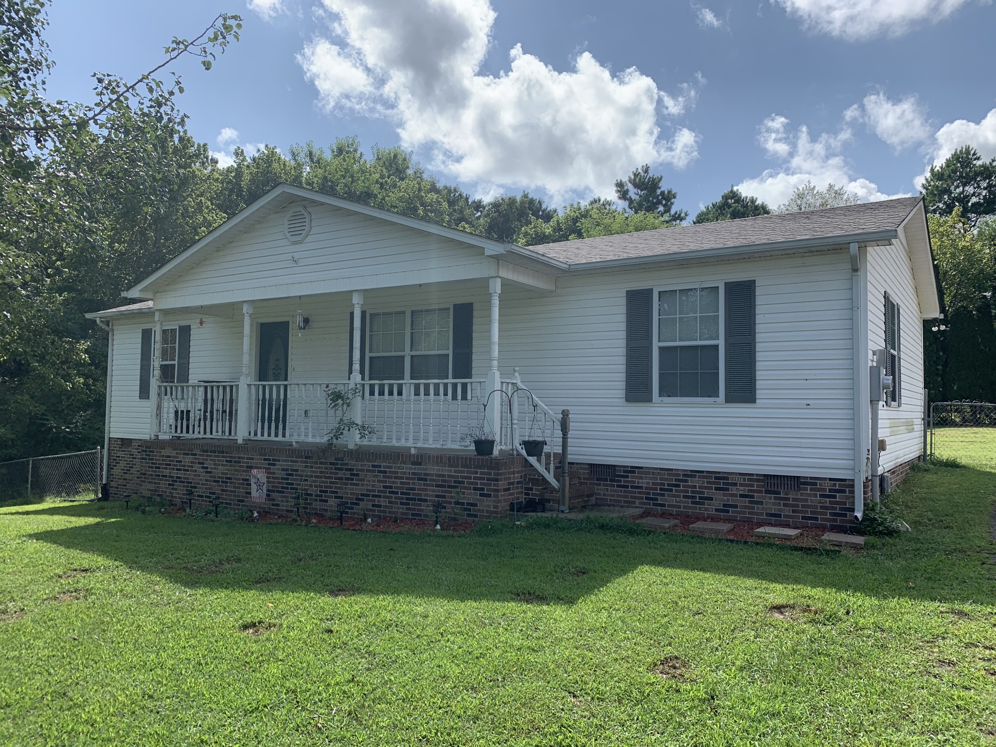 819 Hayes Road Lawrenceburg, TN 38464 - Photo 1 of 42 a view of a house with a yard