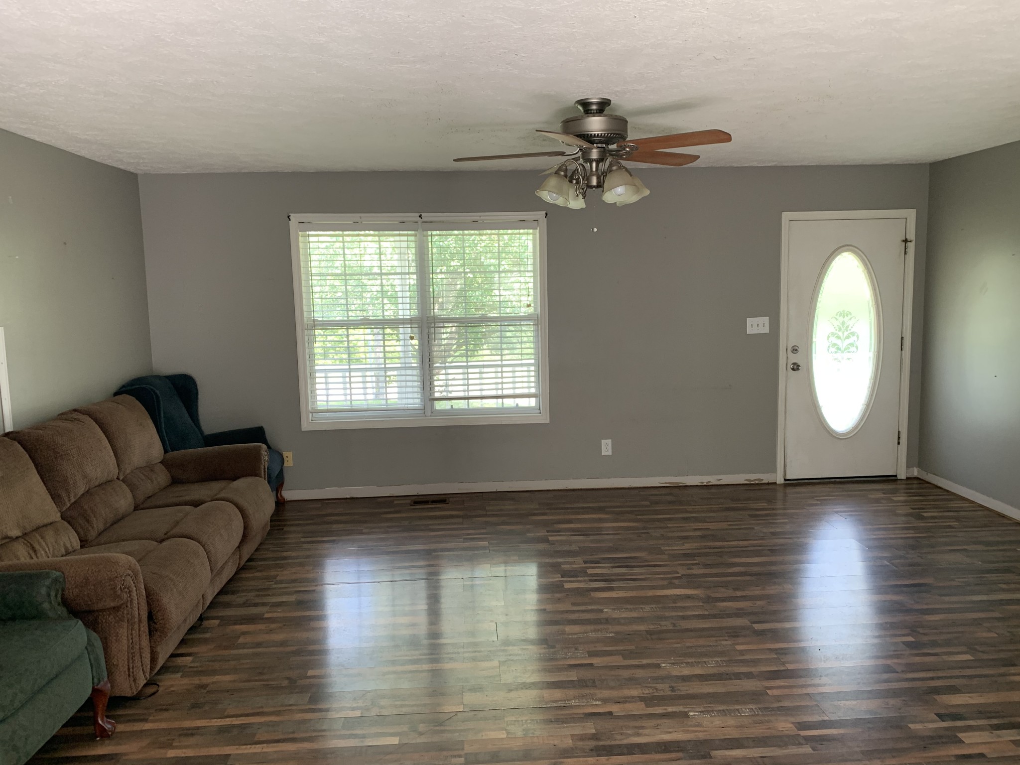 819 Hayes Road Lawrenceburg, TN 38464 - Photo 16 of 42 a view of livingroom with furniture wooden floor and window