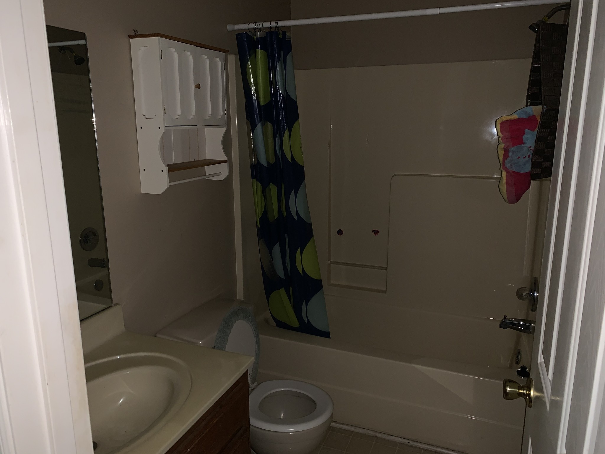 819 Hayes Road Lawrenceburg, TN 38464 - Photo 17 of 42 a bathroom with a granite countertop sink toilet and shower