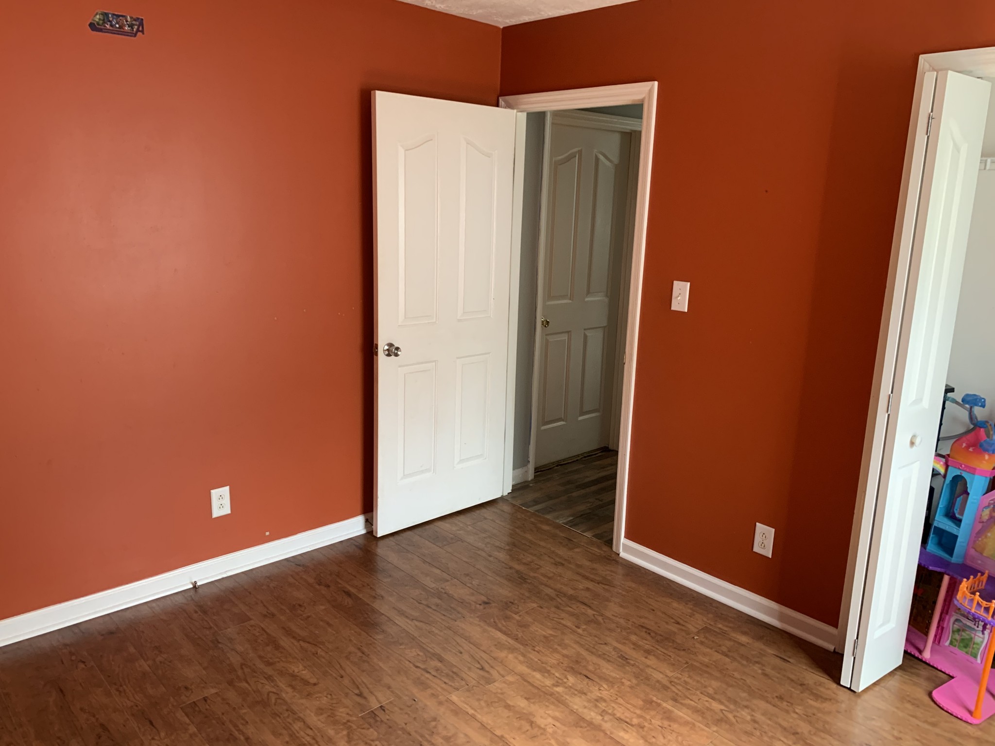 819 Hayes Road Lawrenceburg, TN 38464 - Photo 19 of 42 an empty room with wooden floor and closet