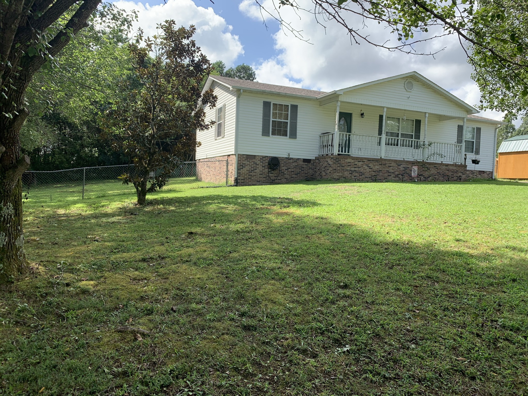 819 Hayes Road Lawrenceburg, TN 38464 - Photo 2 of 42 a view of a house with a yard