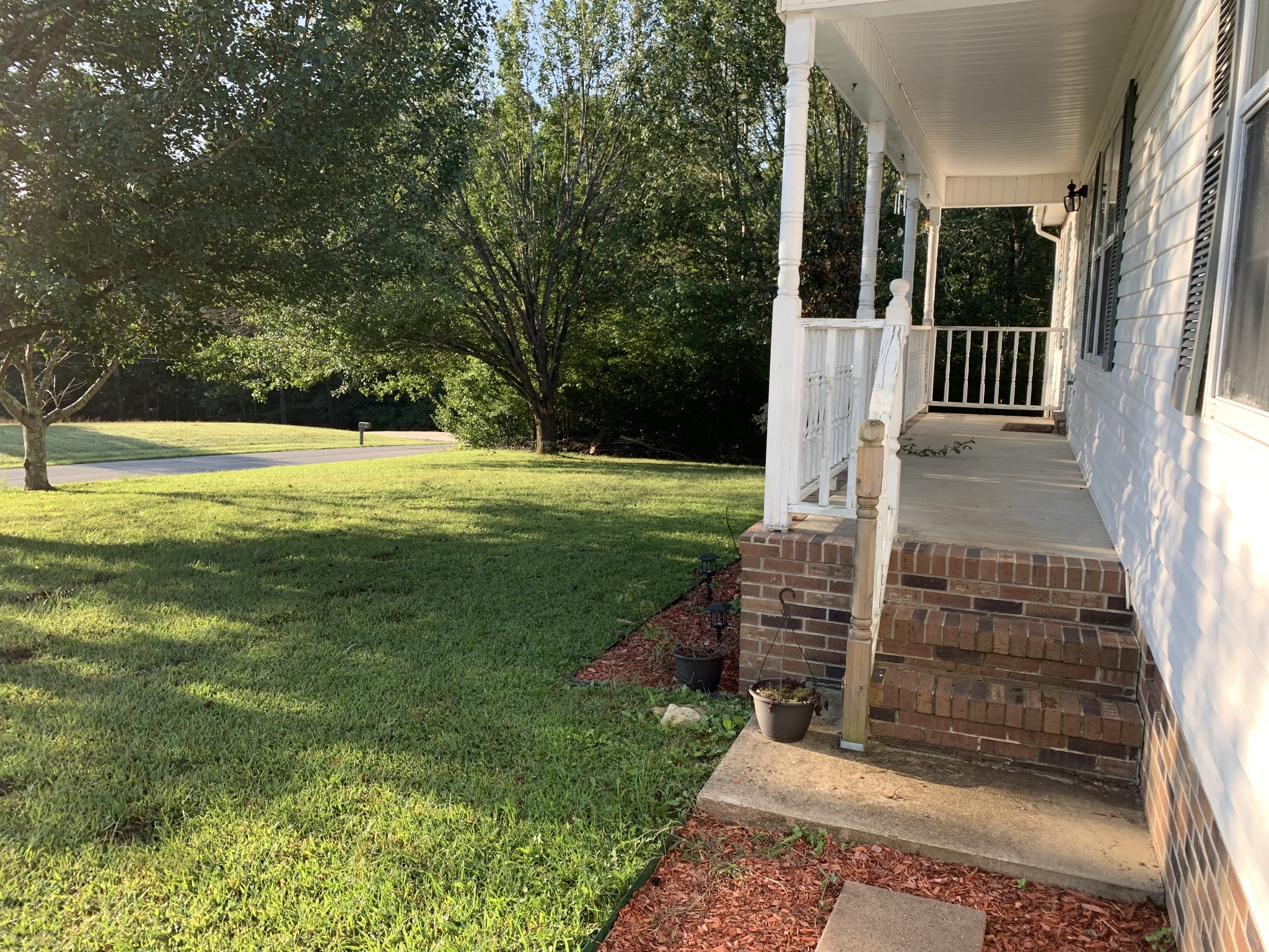 819 Hayes Road Lawrenceburg, TN 38464 - Photo 3 of 42 a view of a patio with a yard