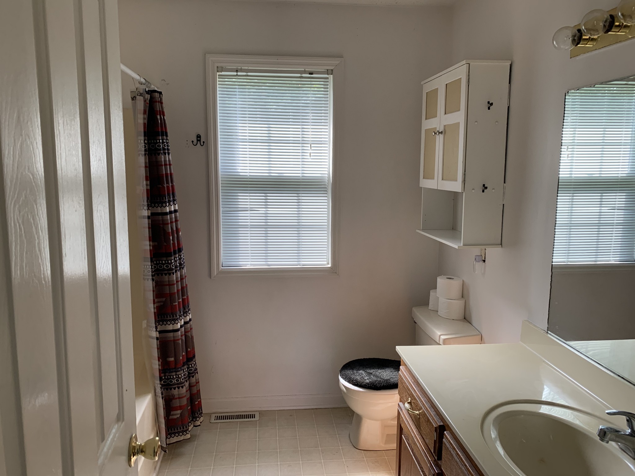 819 Hayes Road Lawrenceburg, TN 38464 - Photo 31 of 42 a bathroom with a sink toilet and window