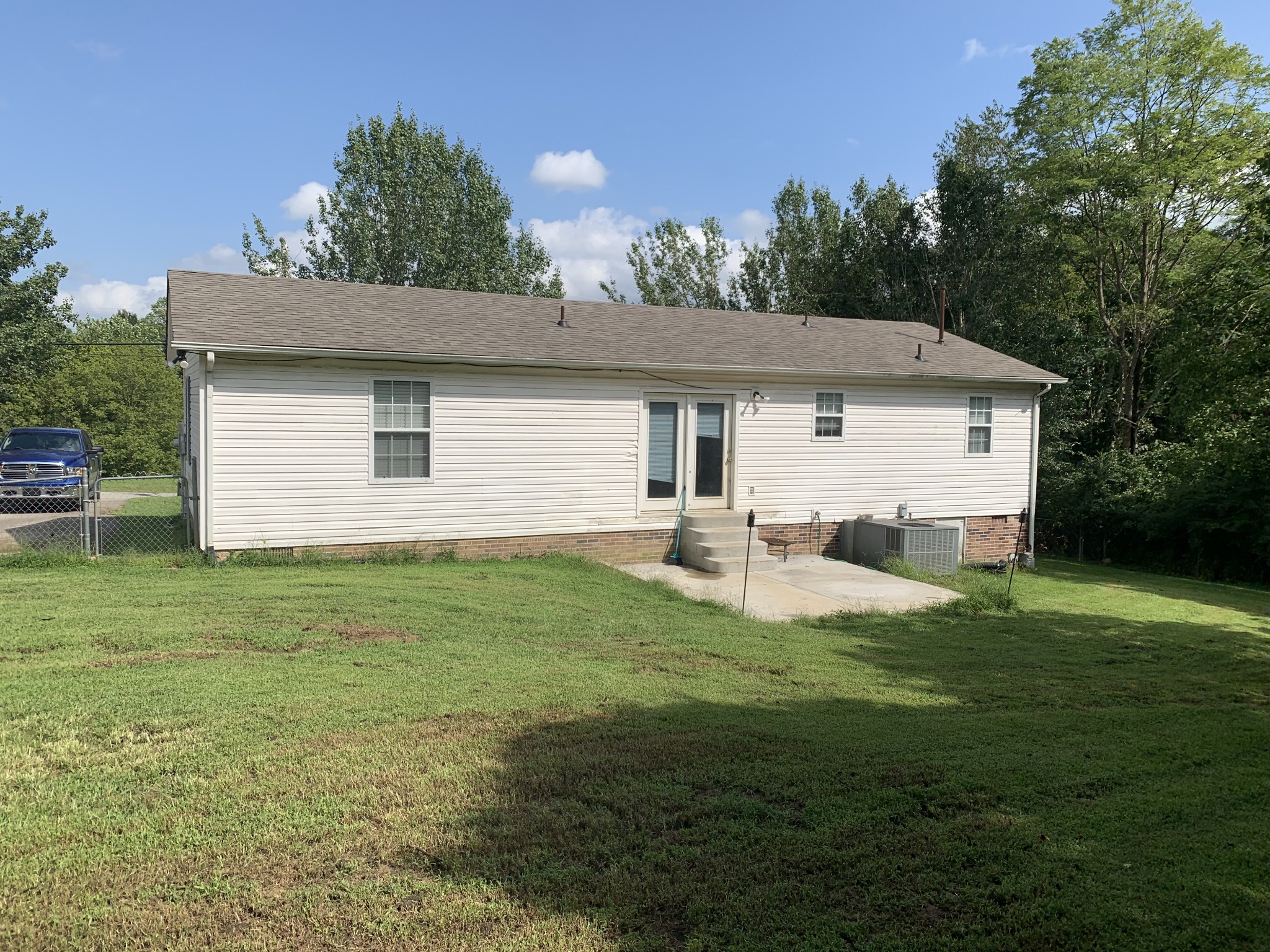 819 Hayes Road Lawrenceburg, TN 38464 - Photo 38 of 42 a front view of house with yard and trees