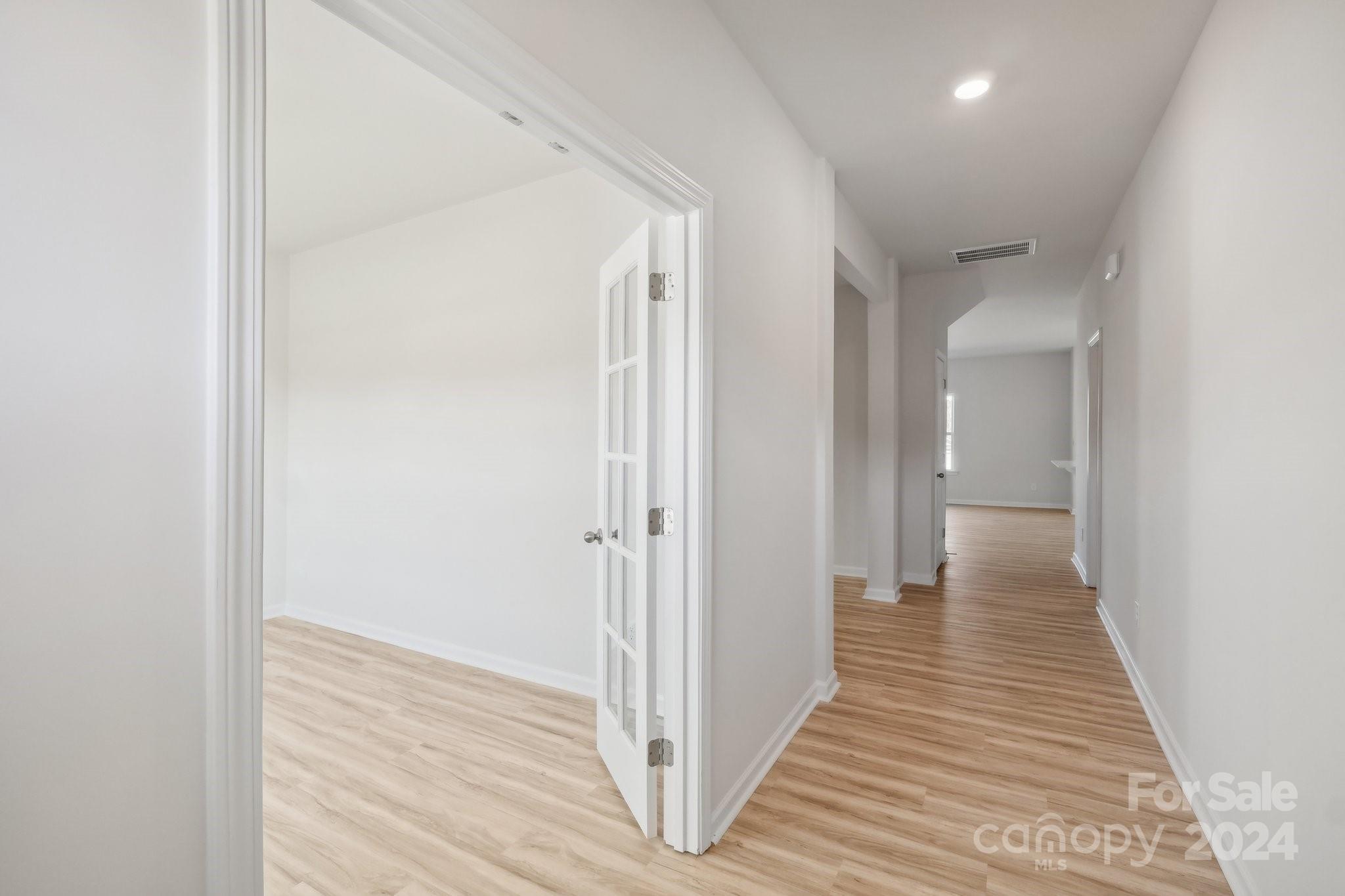7914 Old Brk Road Sherrills Ford, NC 28673 - Photo 14 of 41 a view of a hallway with wooden floor