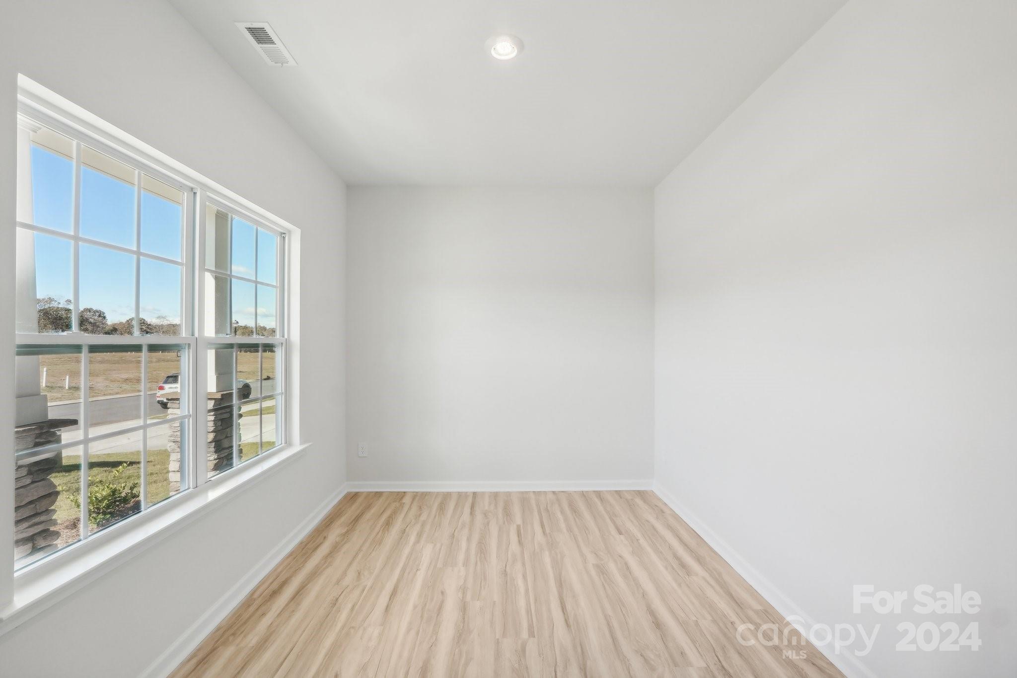 7914 Old Brk Road Sherrills Ford, NC 28673 - Photo 15 of 41 an empty room with a window