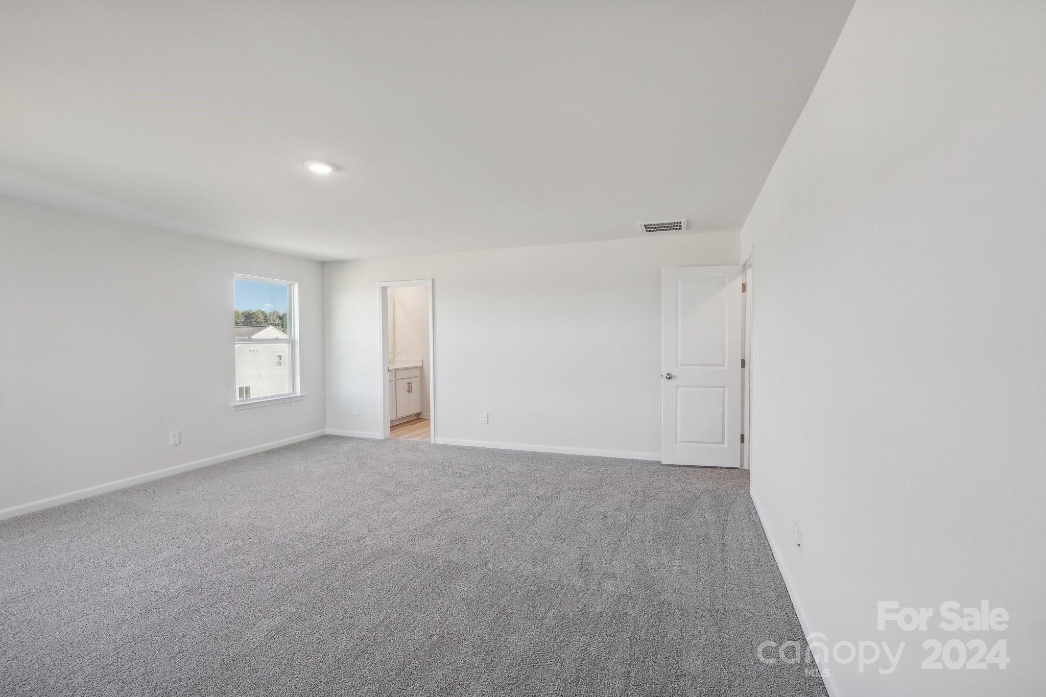 7914 Old Brk Road Sherrills Ford, NC 28673 - Photo 19 of 41 a view of an empty room with a window