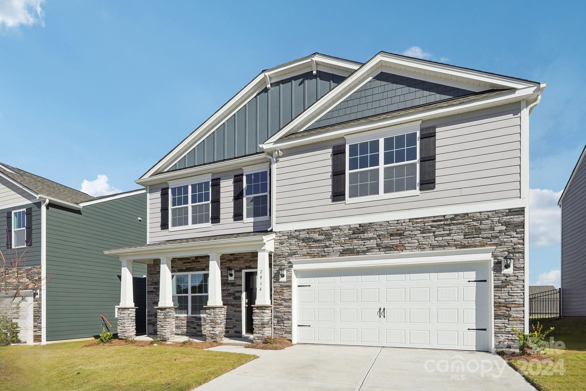7914 Old Brk Road Sherrills Ford, NC 28673 - Photo 2 of 41 a front view of a house with garden