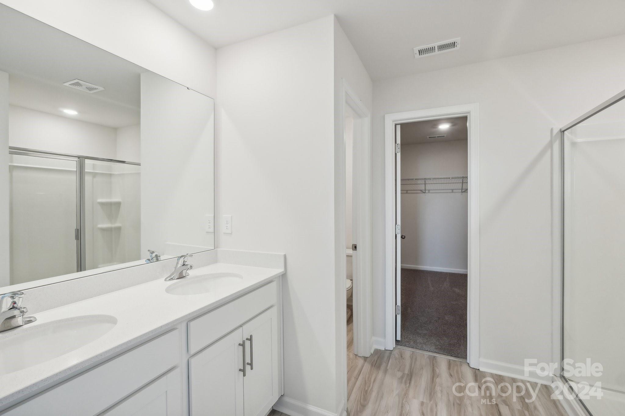 7914 Old Brk Road Sherrills Ford, NC 28673 - Photo 21 of 41 a bathroom with a sink and a mirror