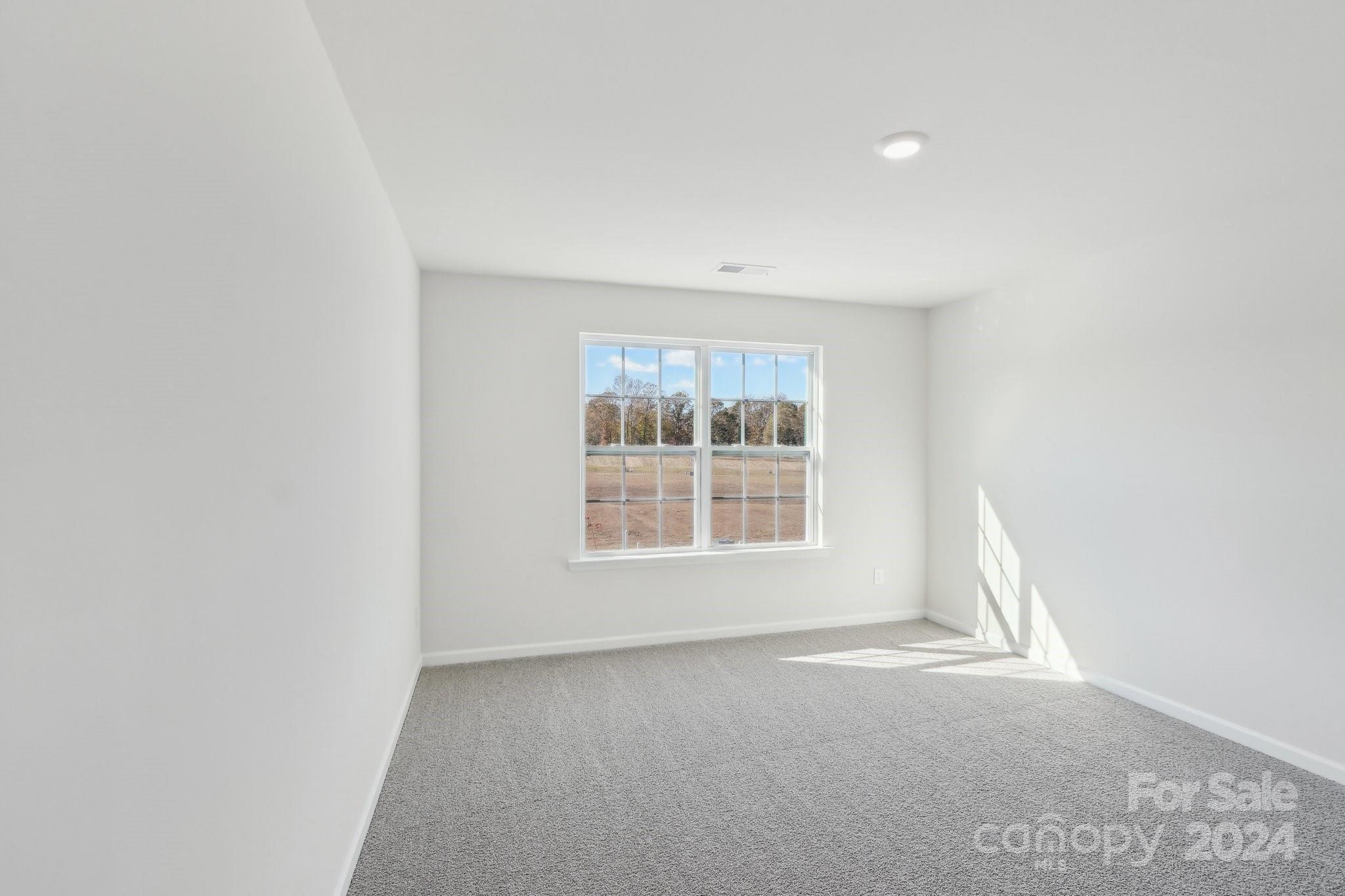 7914 Old Brk Road Sherrills Ford, NC 28673 - Photo 23 of 41 an empty room with a window