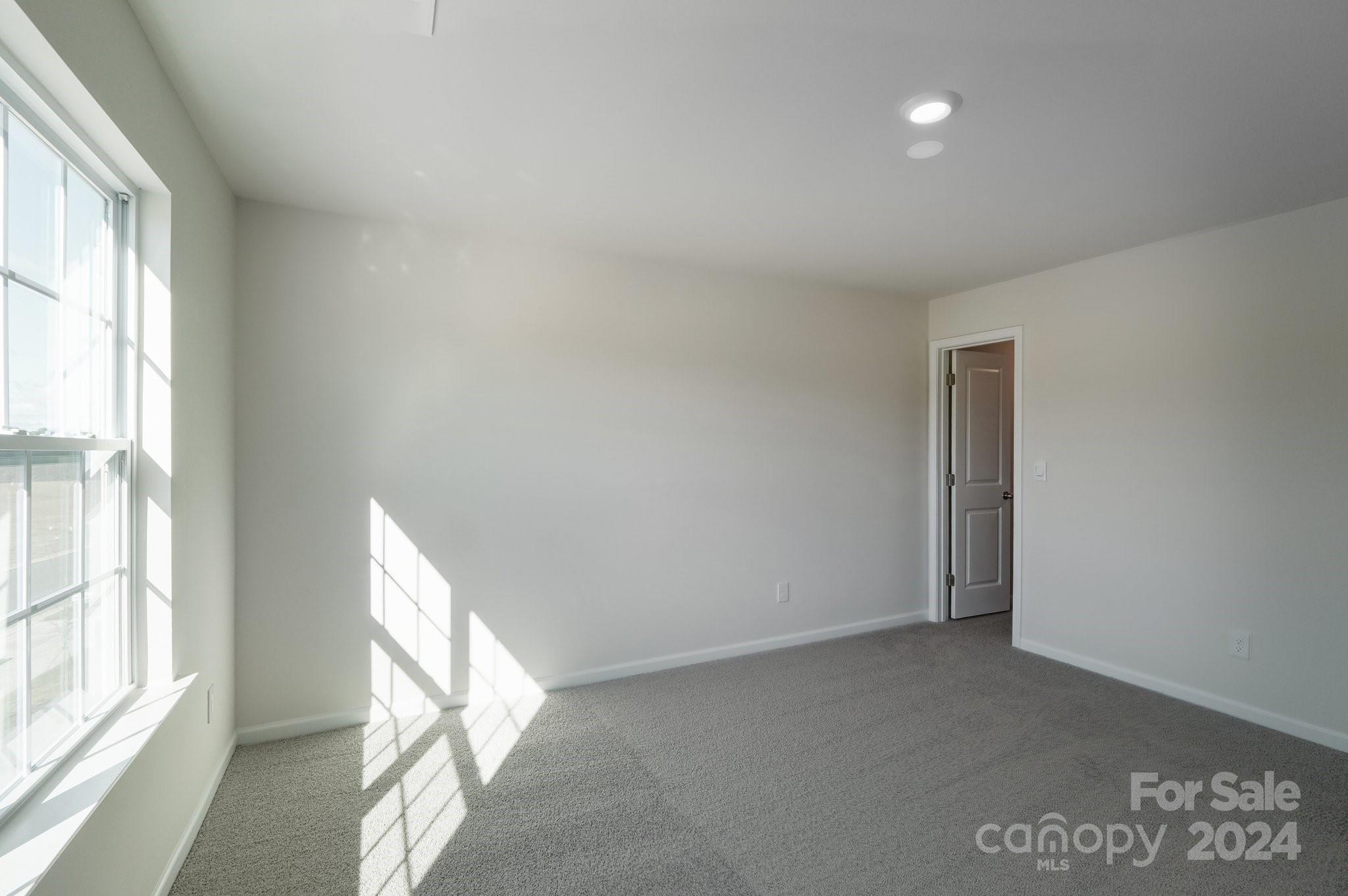 7914 Old Brk Road Sherrills Ford, NC 28673 - Photo 24 of 41 a view of an empty room and a window