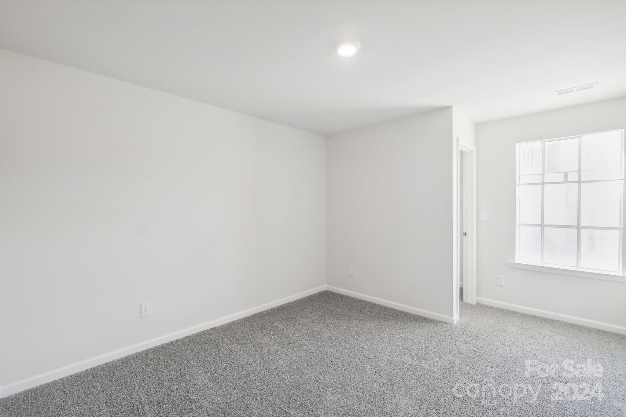 7914 Old Brk Road Sherrills Ford, NC 28673 - Photo 26 of 41 an empty room with a window