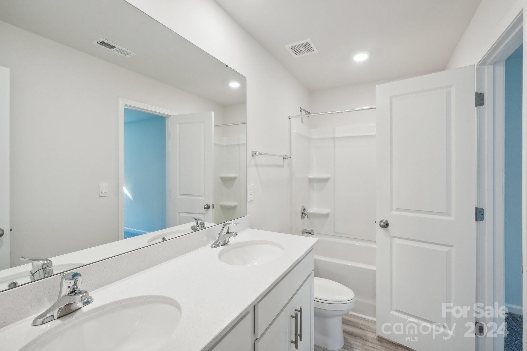 7914 Old Brk Road Sherrills Ford, NC 28673 - Photo 28 of 41 a bathroom with a sink toilet and shower